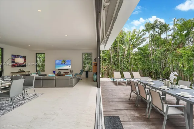 an outdoor space with furniture