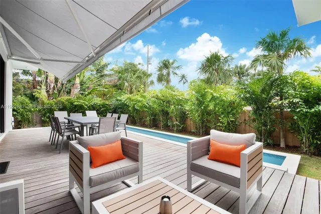 a outdoor living space with furniture and garden view