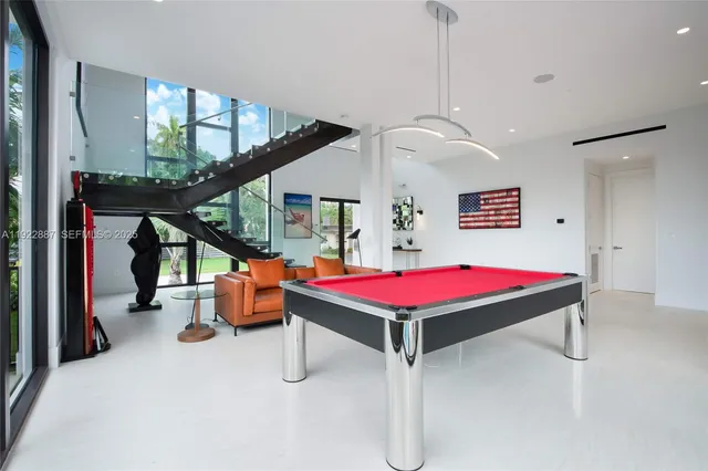 a room with stairs and white walls