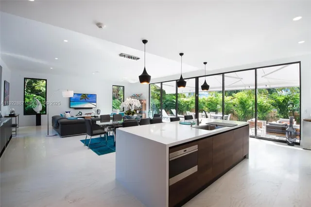a view of living room with furniture and garden view