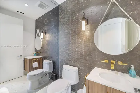 $5,490,000 | 7501 Coquina Drive, North Bay Village, FL 33141