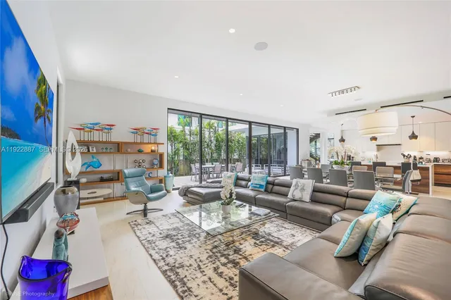a outdoor space with patio the couches and a dining table with garden view