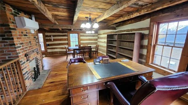 a view of a chairs and table in a patio