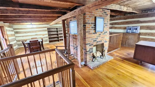 a view of a porch with wooden floor