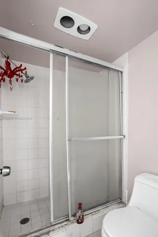 a bathroom with a sink and toilet