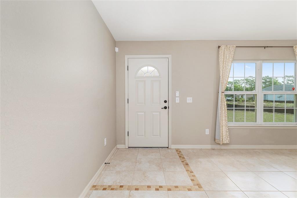 2 Hemlock Loop Drive Ocala, FL 34472 - Photo 3 of 28 an empty room with windows
