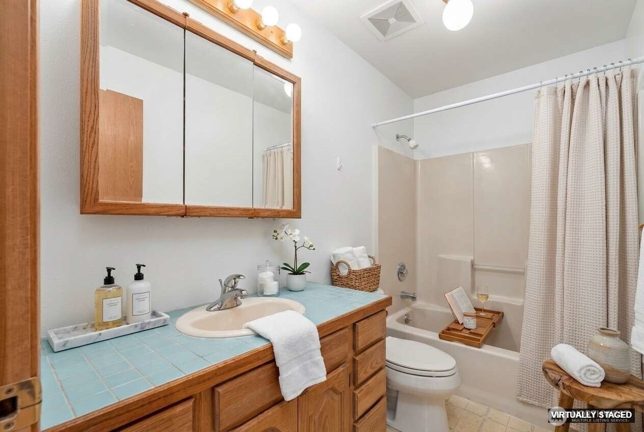 11 Pateros Fish Hatchery Road Pateros, WA 98846 - Photo 20 of 33 a bathroom with a granite countertop sink mirror vanity and toilet