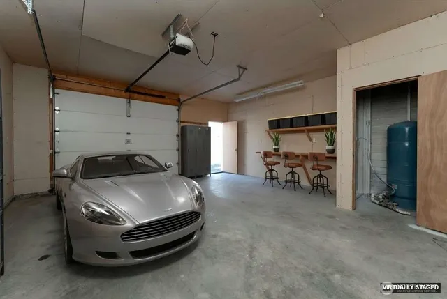 a room with furniture and a chandelier