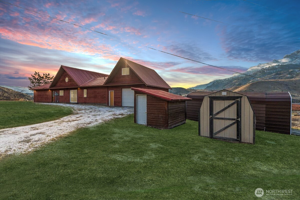 11 Pateros Fish Hatchery Road Pateros, WA 98846 - Photo 25 of 33 a view of a house with a backyard