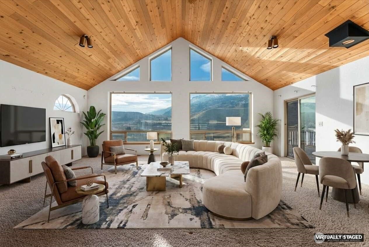 11 Pateros Fish Hatchery Road Pateros, WA 98846 - Photo 3 of 33 a living room with furniture and a flat screen tv