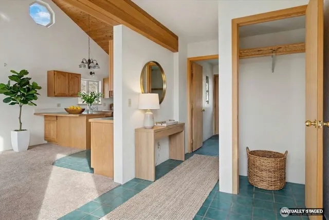 a view of living room and kitchen