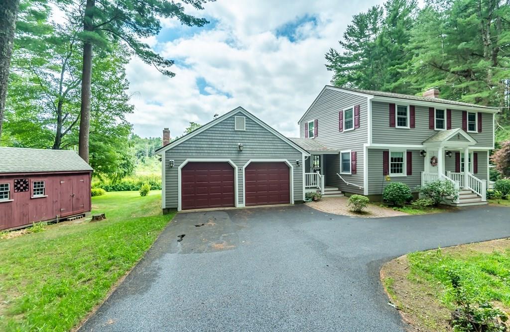 19 Willow Road Boxford, MA 01921 - Photo 3 of 32 a view of a house with yard and a garden