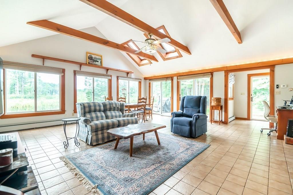 19 Willow Road Boxford, MA 01921 - Photo 7 of 32 a living room with furniture and a floor to ceiling window