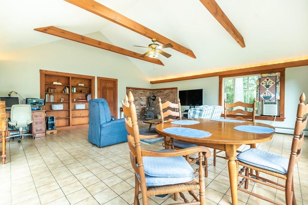 19 Willow Road Boxford, MA 01921 - Photo 9 of 32 a view of a dining room with furniture window and outside view