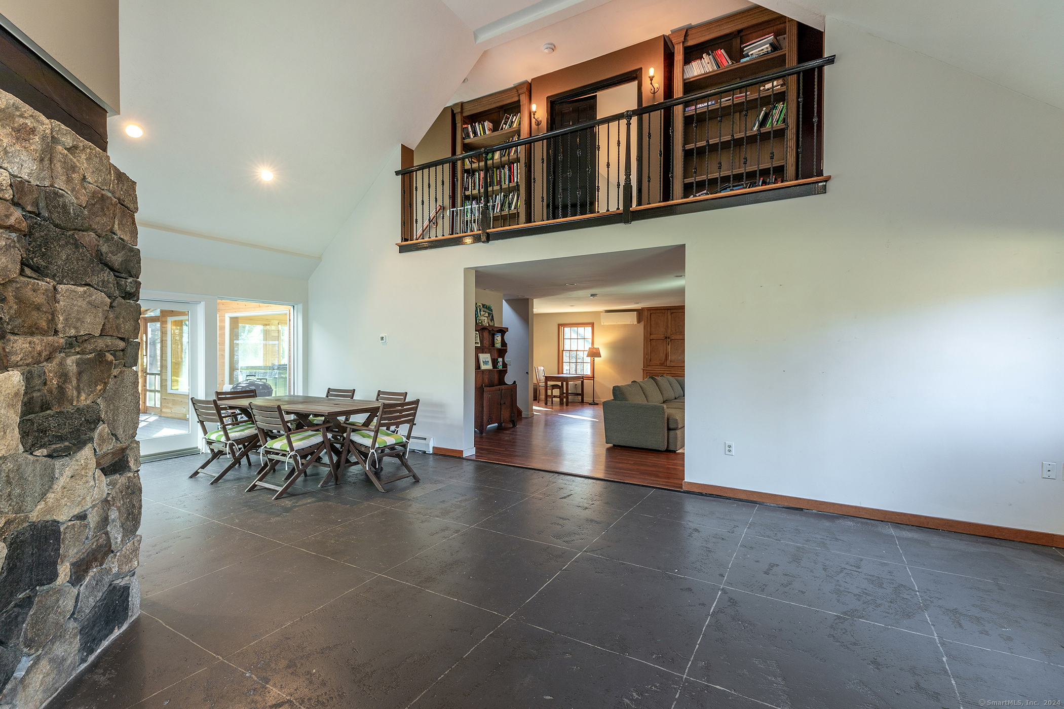 28 Headquarters Road Litchfield, CT 06759 - Photo 2 of 28 a view of a entryway with furniture and chandelier