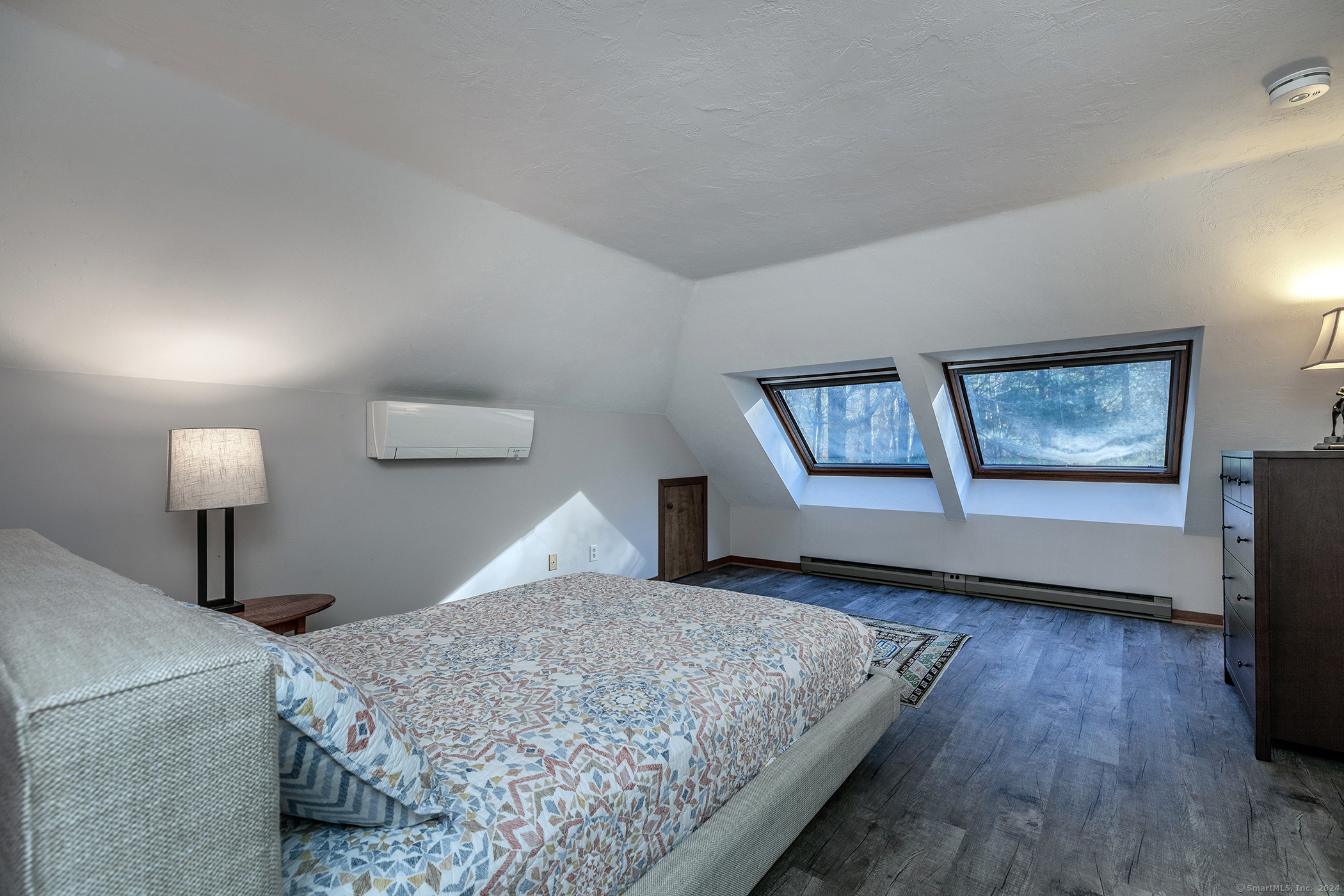 28 Headquarters Road Litchfield, CT 06759 - Photo 22 of 28 a bedroom with a bed and a night stand