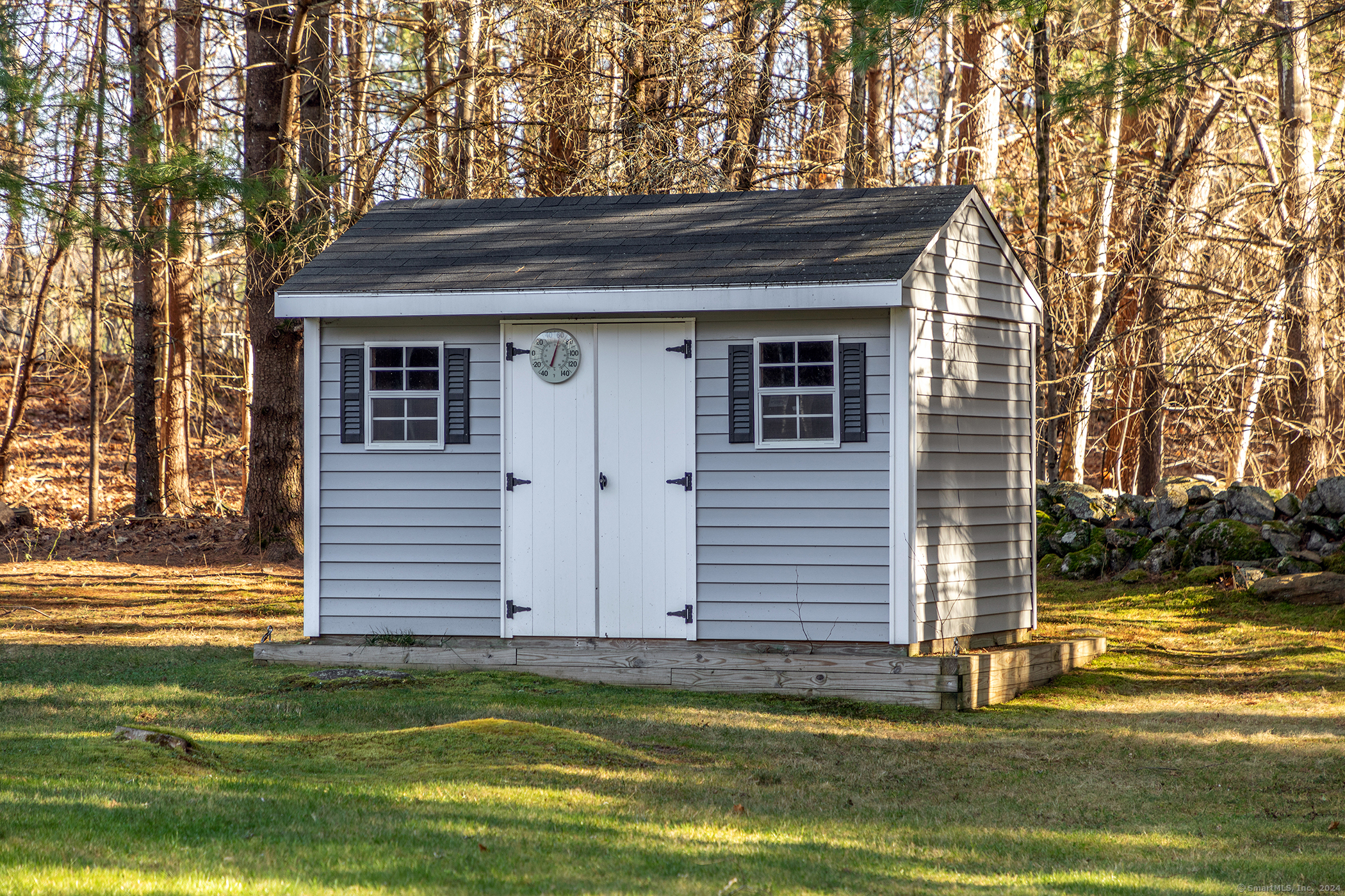 28 Headquarters Road Litchfield, CT 06759 - Photo 25 of 28 a view of a house with a yard