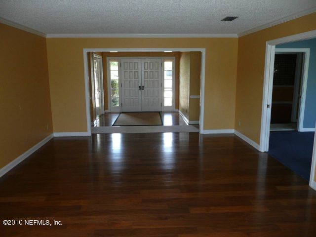 329 Pablo Road Ponte Vedra Beach, FL 32082 - Photo 3 of 6 a view of livingroom with hardwood floor