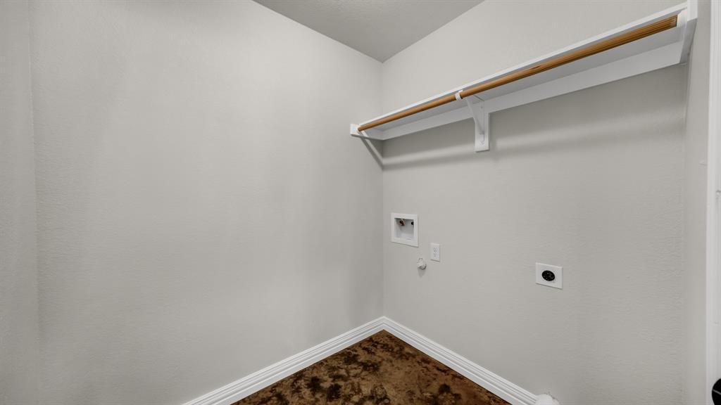 1830 Hitching Post Road Granbury, TX 76049 - Photo 19 of 34 a view of a rack on the wall