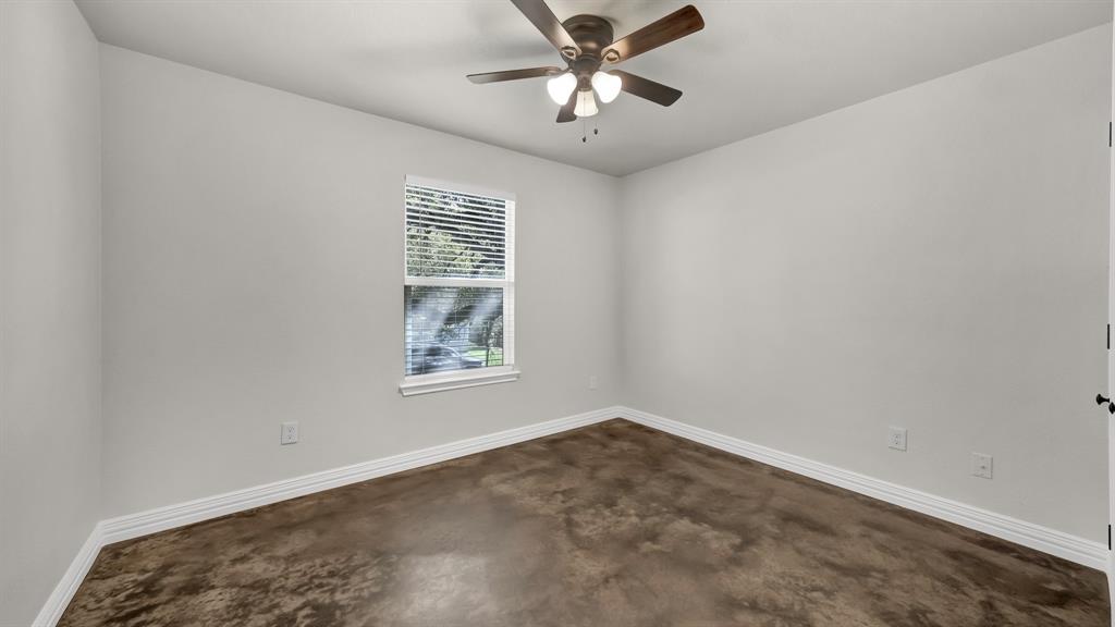 1830 Hitching Post Road Granbury, TX 76049 - Photo 28 of 34 a view of an empty room with a window