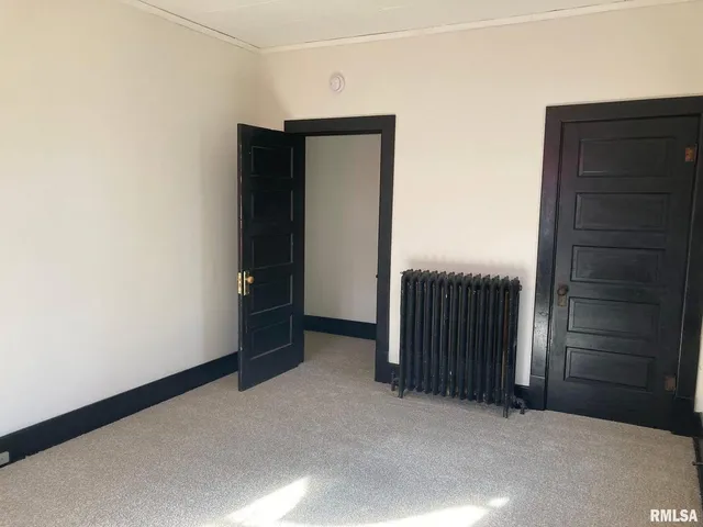 a view of a room with a window