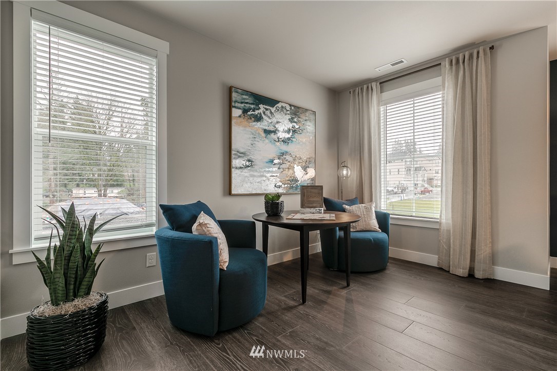 23205 89th Avenue West, Unit 8 Edmonds, WA 98026 - Photo 19 of 37 a living room with furniture and a potted plant