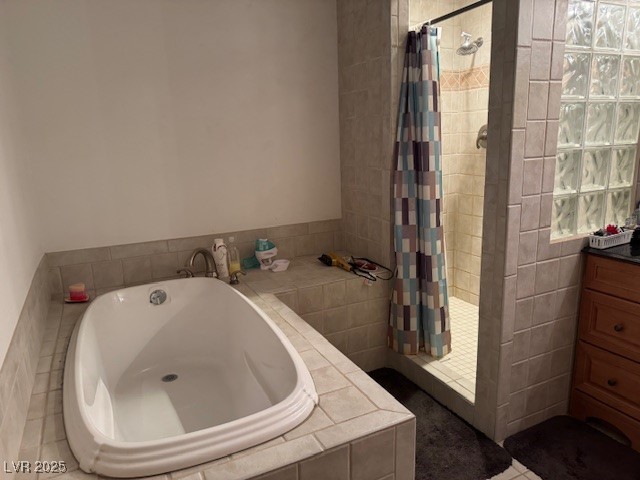 1560 Fort Churchill Road Pahrump, NV 89060 - Photo 14 of 24 Full bath featuring a shower stall, a bath, and va