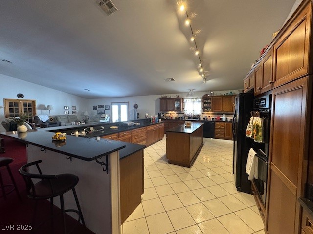 1560 Fort Churchill Road Pahrump, NV 89060 - Photo 5 of 24 Kitchen featuring light tile patterned floors, bla