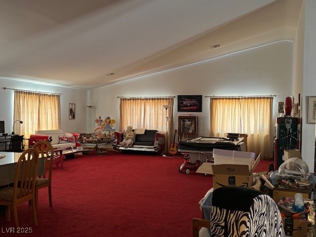 1560 Fort Churchill Road Pahrump, NV 89060 - Photo 8 of 24 Living area featuring lofted ceiling and carpet fl