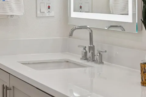 a bathroom with a shower and a toilet