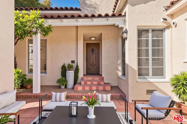 a front view of a house with patio