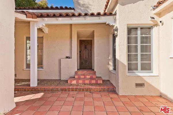 a view of a entryway door of the house