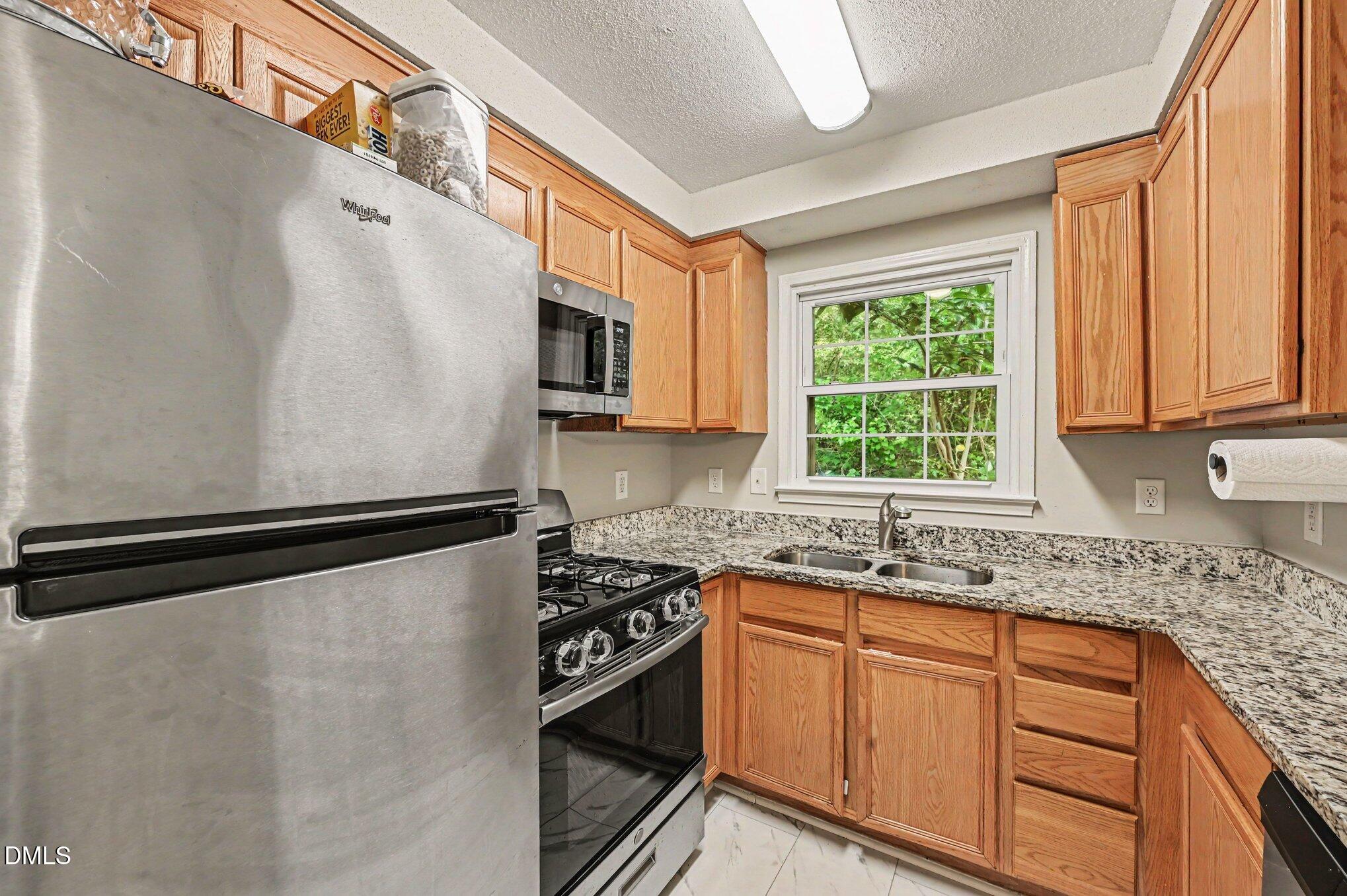 4704 Blue Bird Court, Unit D Raleigh, NC 27606 - Photo 10 of 28 010_file_2404