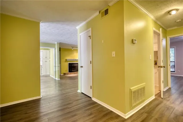 a bed room with a bed and a chandelier