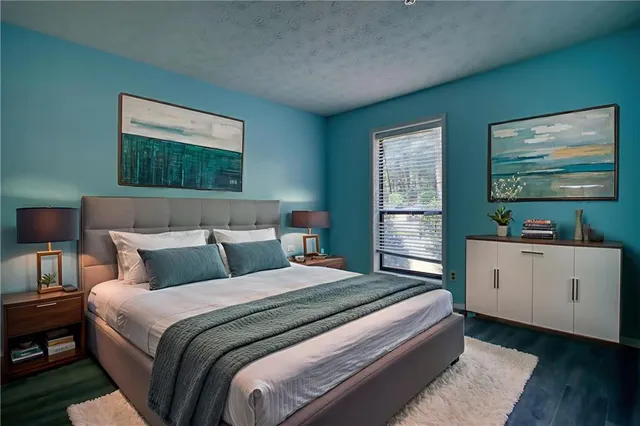 a bathroom with a double vanity sink and mirror