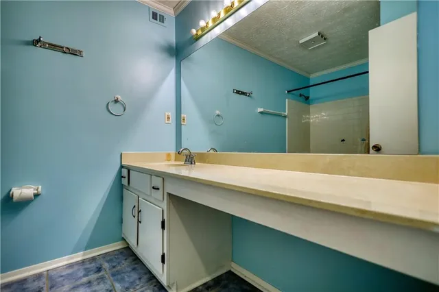 a bathroom with a shower and a toilet