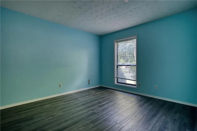 a view of a porch with furniture and floor