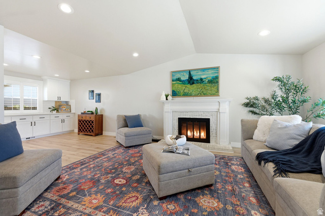 1405 Vintry Lane Murray, UT 84121 - Photo 8 of 44 Living area with a fireplace featuring an ornate mantel and hearth