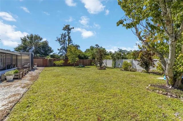 a view of a yard with a house