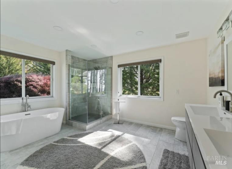 35800 Highway 1 Gualala, CA 95445 - Photo 22 of 42 a spacious bathroom with a bathtub and sink