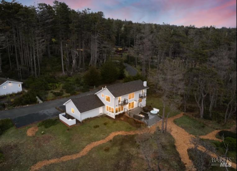 35800 Highway 1 Gualala, CA 95445 - Photo 3 of 42 a view of a fire pit in a backyard