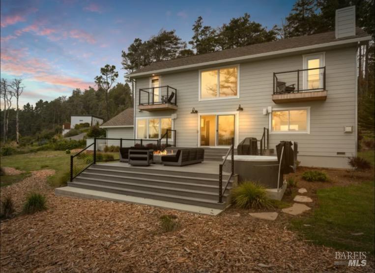 35800 Highway 1 Gualala, CA 95445 - Photo 41 of 42 a view of a house with backyard and sitting area