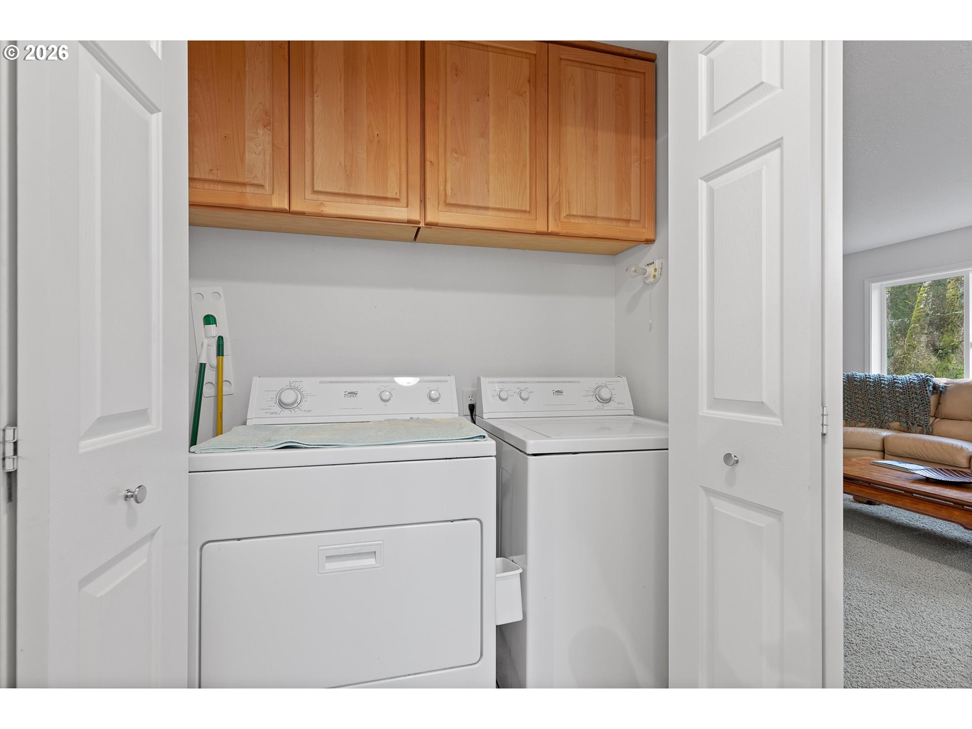 49800 Proposal Rock Loop Neskowin, OR 97149 - Photo 13 of 29 a utility room with dryer and washer
