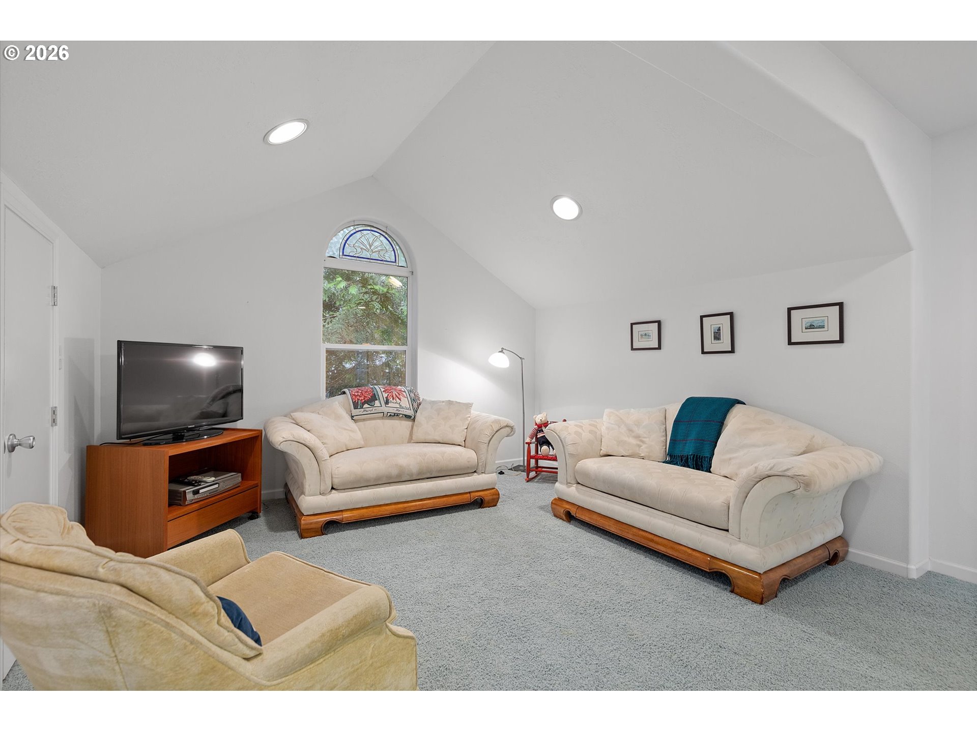 49800 Proposal Rock Loop Neskowin, OR 97149 - Photo 14 of 29 a living room with furniture and a flat screen tv