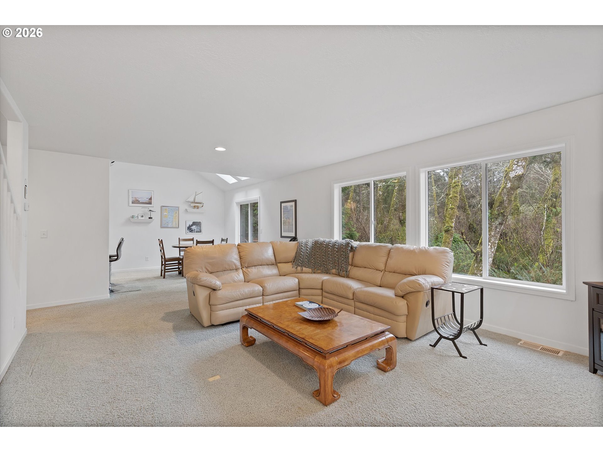 49800 Proposal Rock Loop Neskowin, OR 97149 - Photo 8 of 29 a living room with furniture and a large window