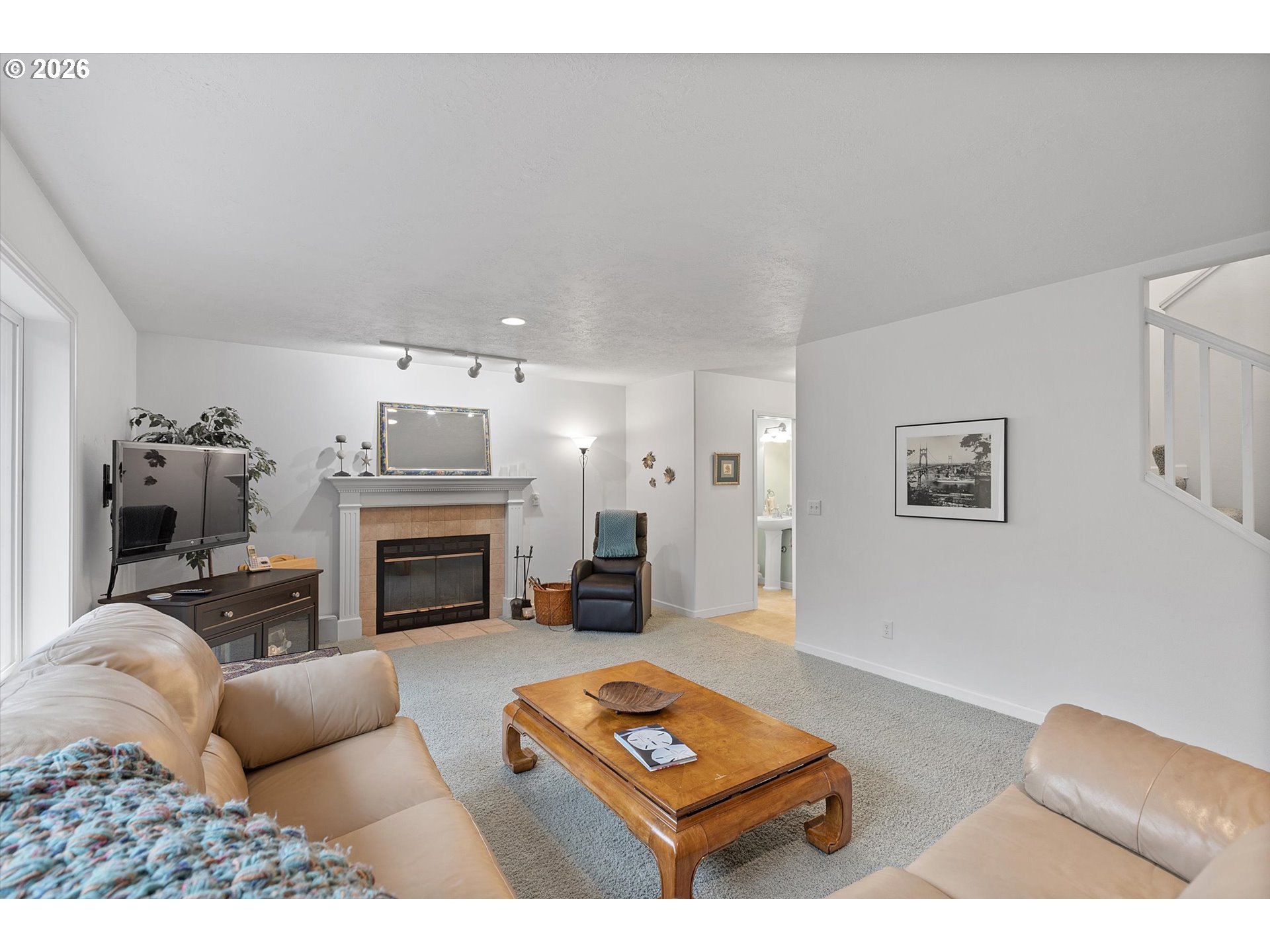 49800 Proposal Rock Loop Neskowin, OR 97149 - Photo 10 of 29 a living room with furniture a fireplace and next to a window