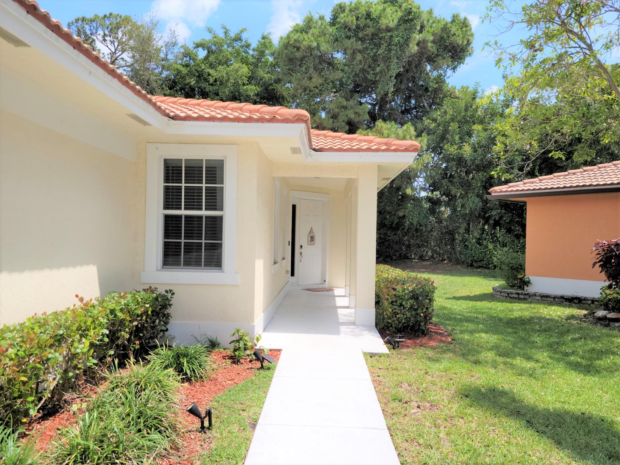 6695 Eagle Ridge Drive Greenacres, FL 33413 - Photo 2 of 23 front door
