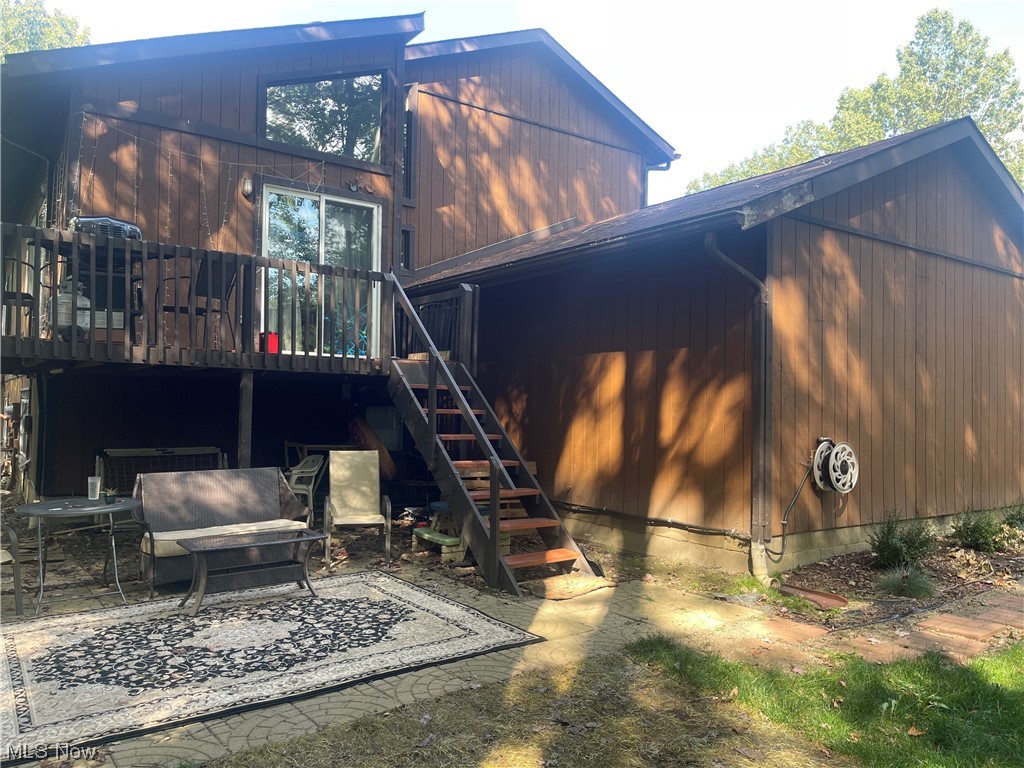 2408 Call Road, Unit 2B Stow, OH 44224 - Photo 8 of 32 Back of house featuring a patio area and a deck