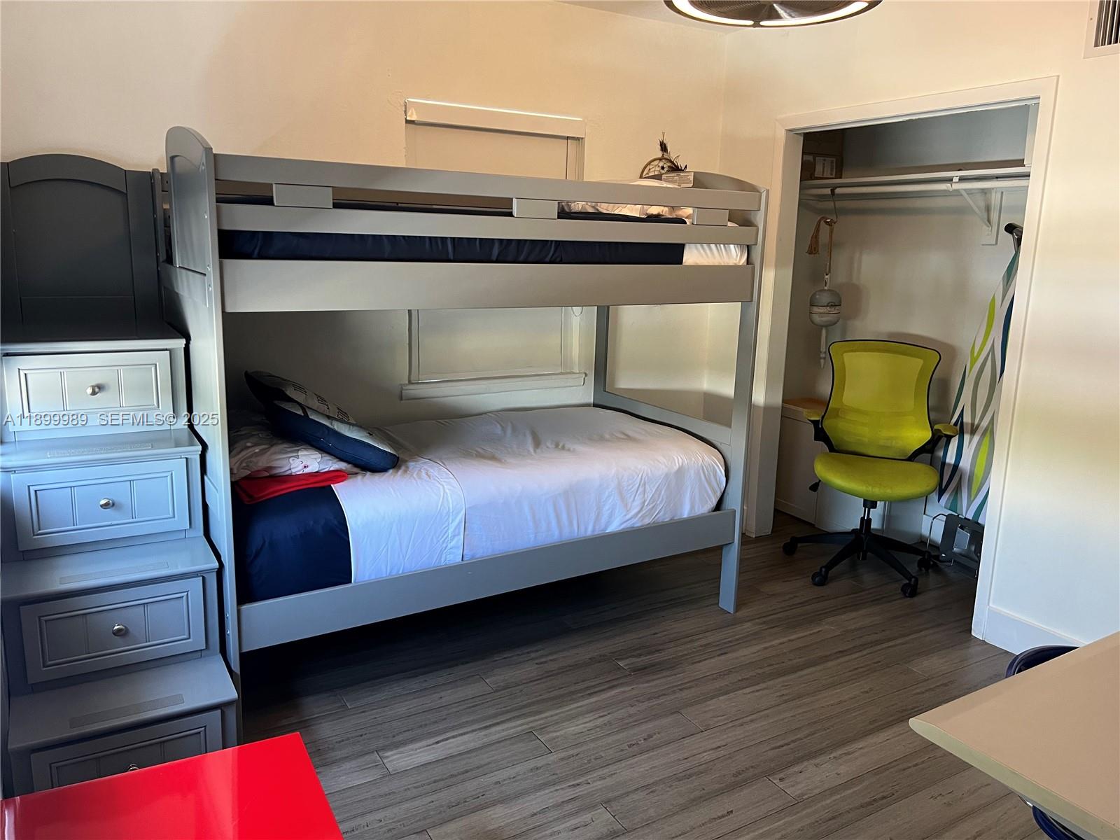 3680 Southwest 13th Terrace Miami, FL 33145 - Photo 11 of 18 a bedroom with a bed and furniture