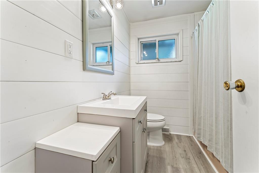 210 Springfield Avenue Washington, PA 15301 - Photo 22 of 28 a bathroom with a sink a toilet and shower